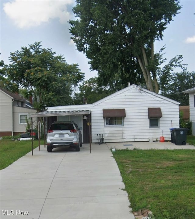 view of front of home with a front yard