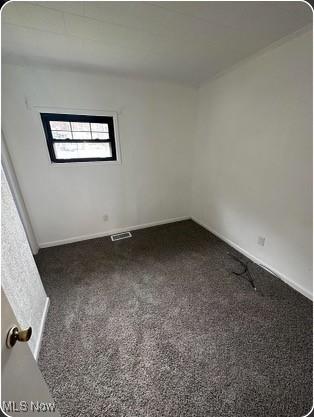 view of carpeted spare room