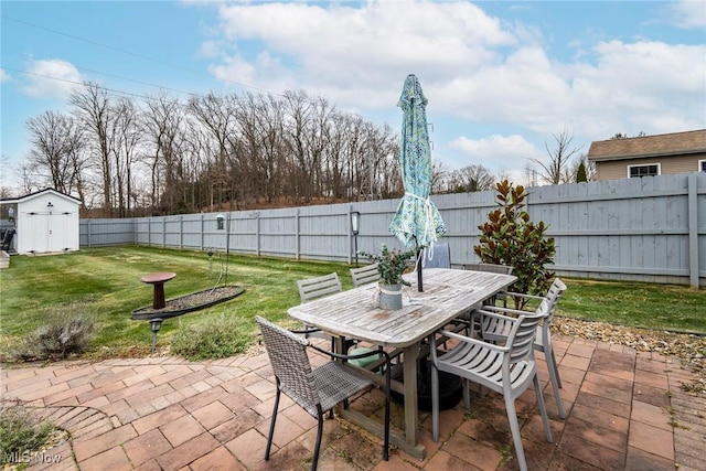 view of patio featuring a storage unit