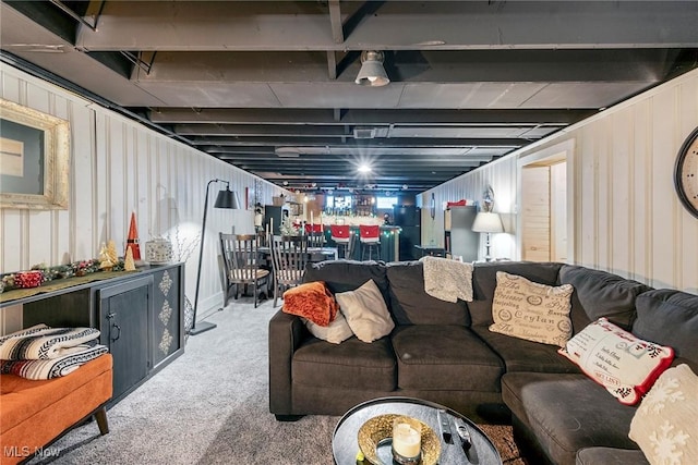 living room featuring carpet and indoor bar