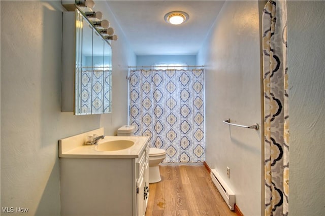 bathroom with baseboard heating, vanity, wood-type flooring, curtained shower, and toilet