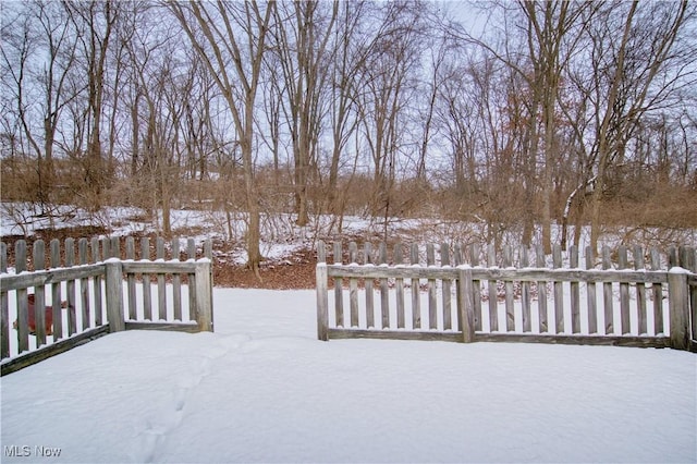 view of snow covered deck