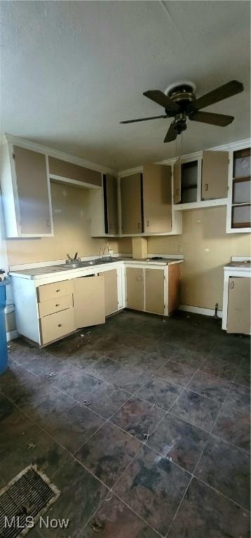 kitchen featuring ceiling fan