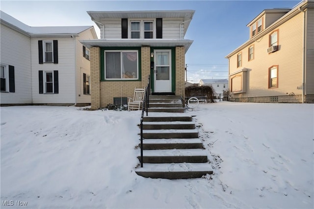 view of front of house with cooling unit