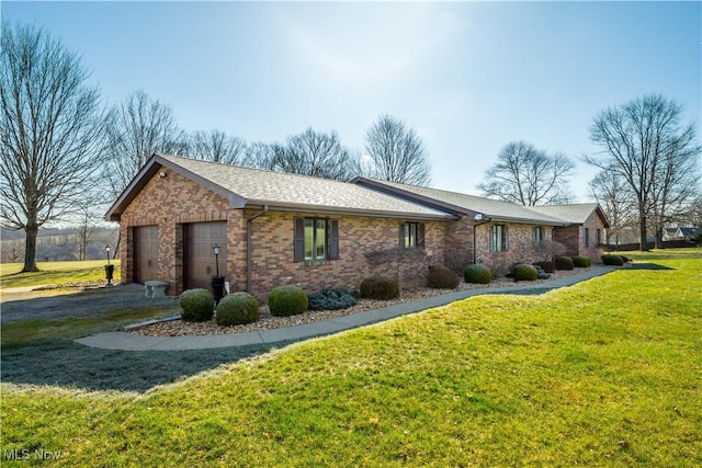 view of property exterior featuring a garage and a lawn