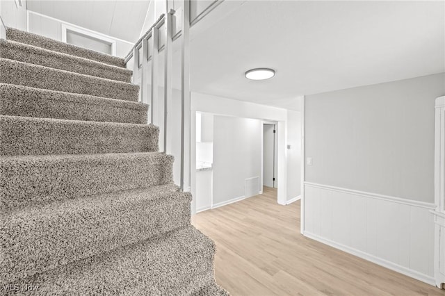 stairway with wood-type flooring