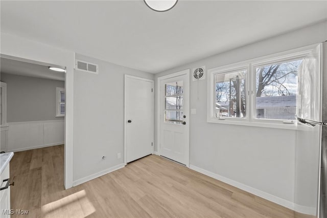 foyer featuring light wood-type flooring