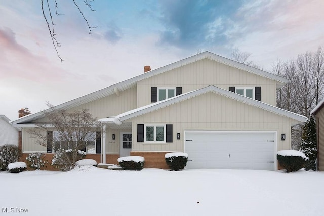 view of front of home with a garage