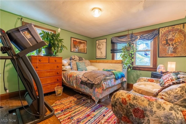 bedroom featuring hardwood / wood-style flooring