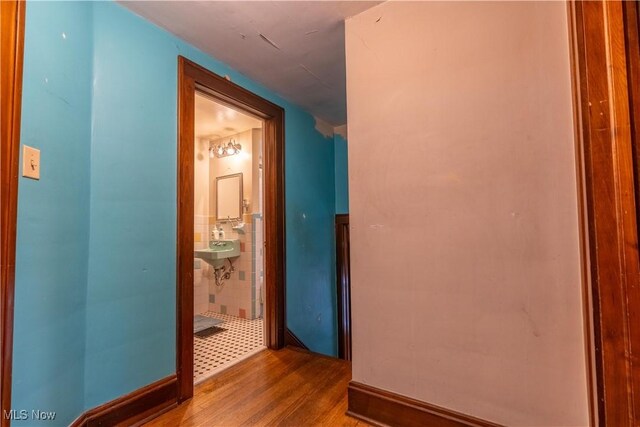 corridor featuring light hardwood / wood-style flooring