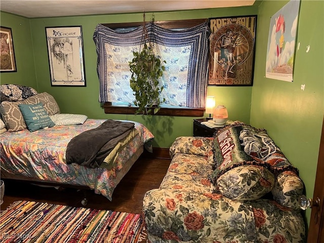 bedroom featuring dark hardwood / wood-style floors