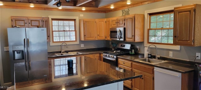 kitchen with stainless steel appliances, sink, and wooden ceiling