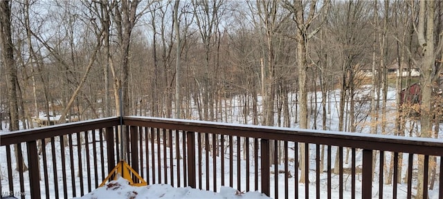 view of snow covered deck