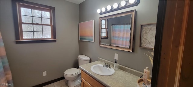 full bath featuring a shower with shower curtain, vanity, toilet, and tile patterned floors