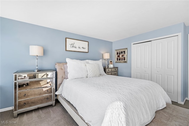 carpeted bedroom featuring a closet