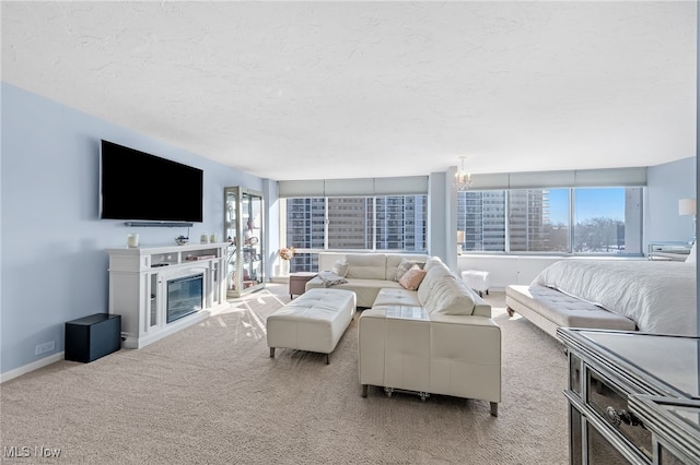 carpeted bedroom with a textured ceiling