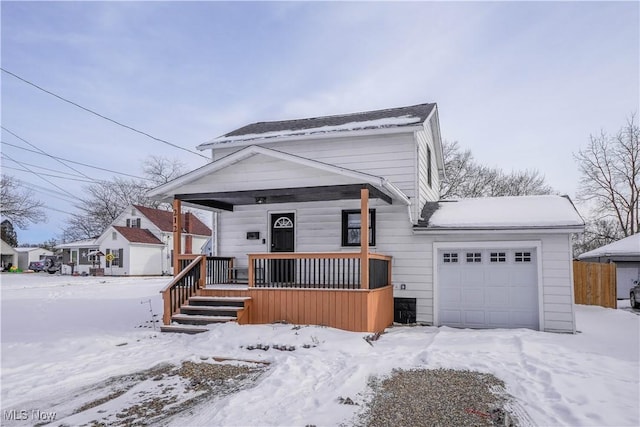 view of front of house with a porch and a garage