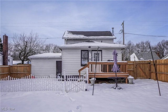 view of front of property with a wooden deck