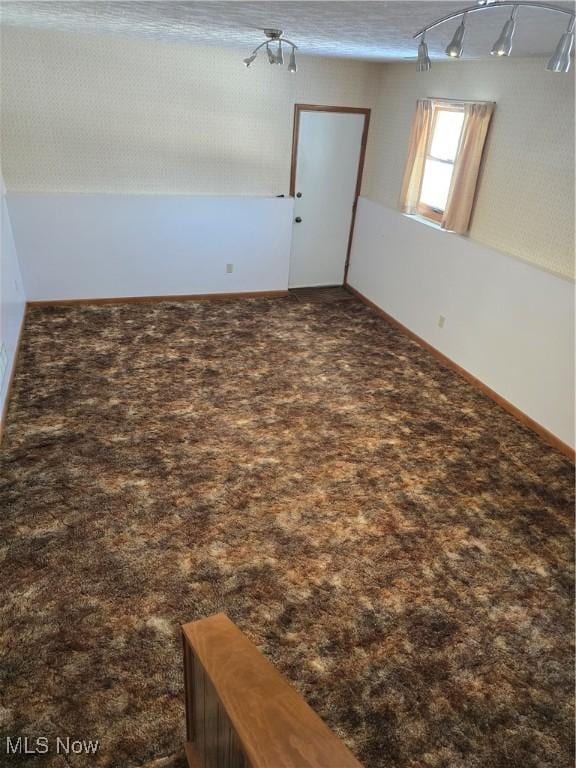 empty room featuring carpet