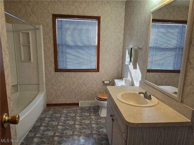 full bathroom featuring  shower combination, toilet, and vanity