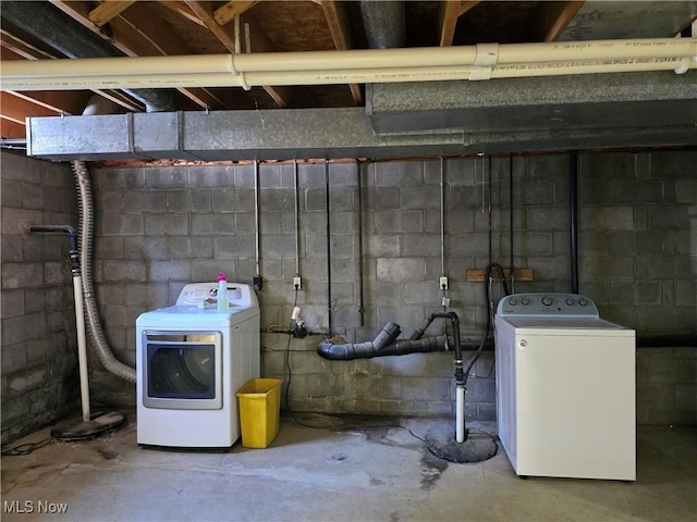 basement with washing machine and dryer