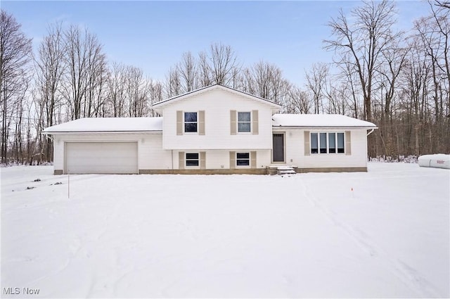 split level home with a garage