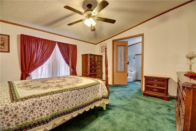 bedroom with vaulted ceiling, ceiling fan, a textured ceiling, ensuite bath, and ornamental molding