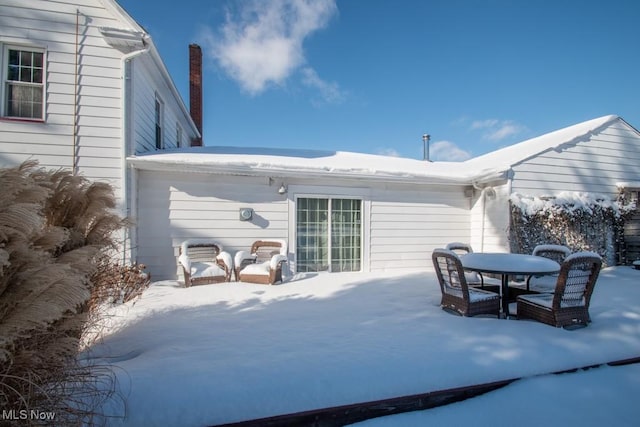 view of snow covered patio