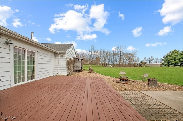 2040 E Middletown Rd, Poland, OH 44514 - wooden deck featuring a lawn and an outdoor fire pit