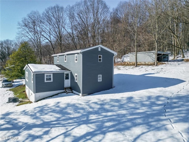 view of snow covered property