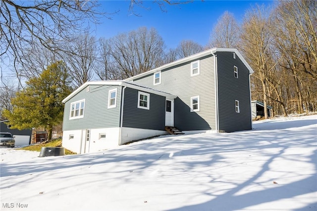 view of snow covered property