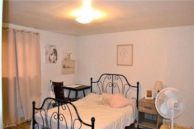 bedroom featuring wood-type flooring