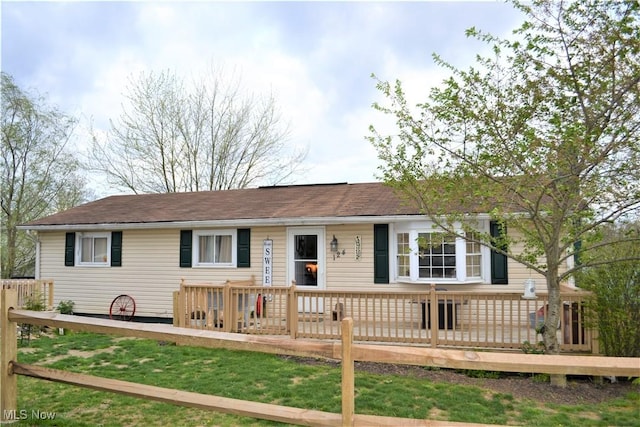 view of front of property with a deck