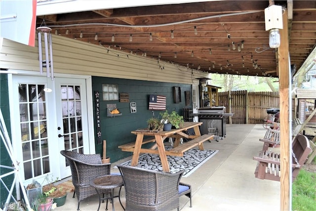 view of patio / terrace with area for grilling and french doors