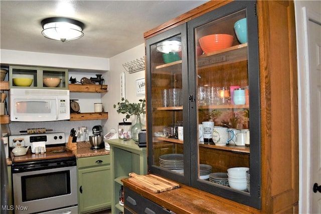 kitchen with stainless steel range with electric stovetop and green cabinets