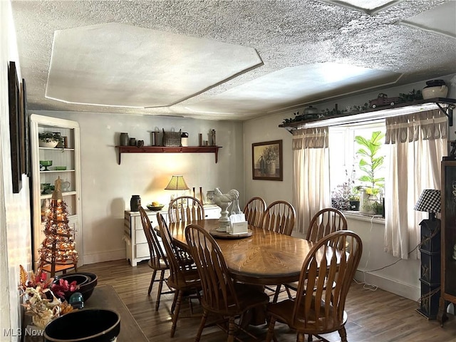 dining room featuring wood-type flooring