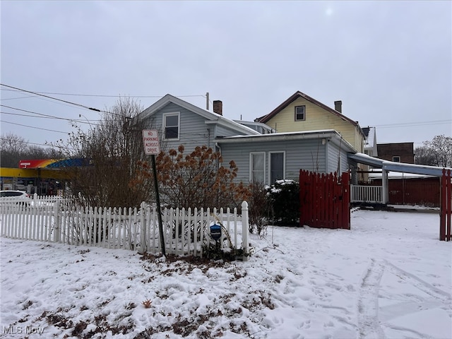 view of snow covered house