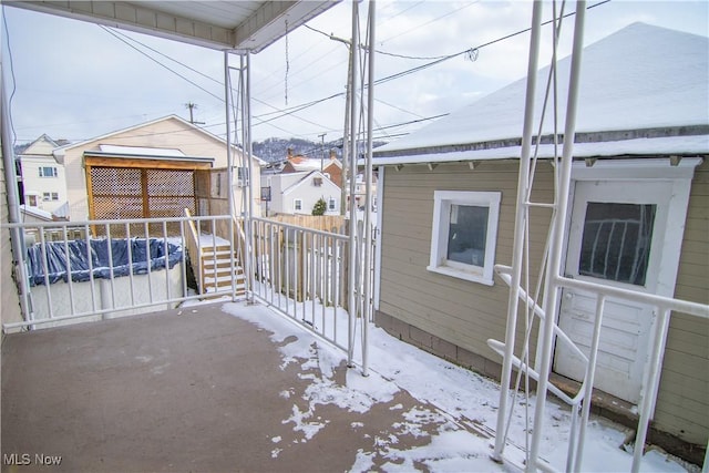 view of snow covered patio