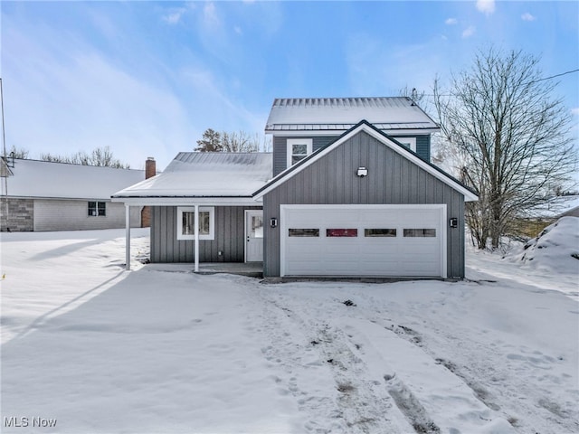 view of front of property featuring a garage