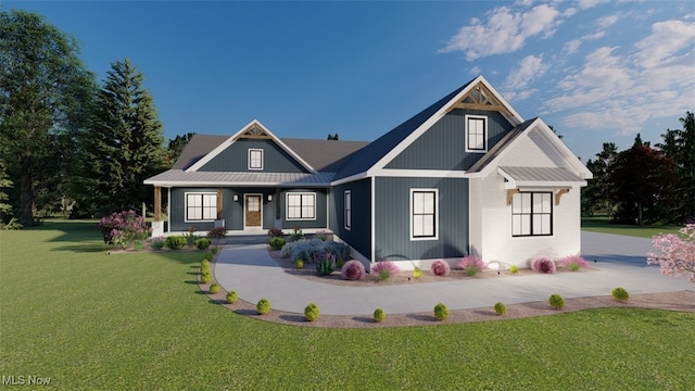 view of front of property with covered porch and a front yard