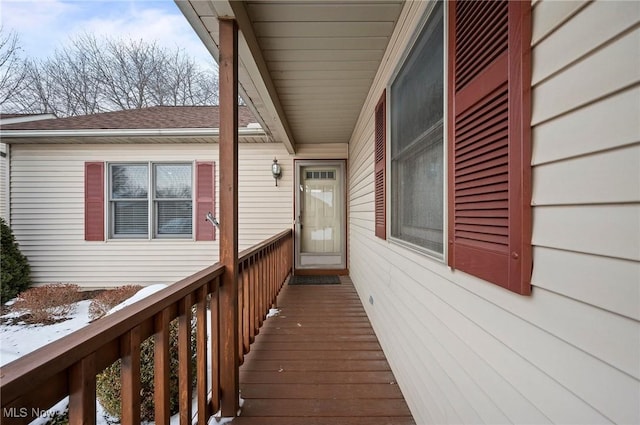 view of snow covered deck