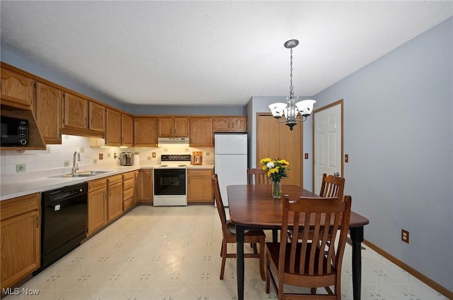 kitchen with hanging light fixtures, sink, backsplash, a notable chandelier, and black appliances