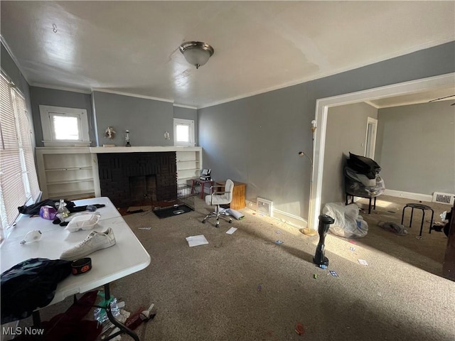 living room featuring plenty of natural light, a brick fireplace, and ornamental molding