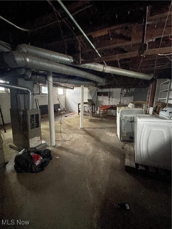 basement featuring separate washer and dryer