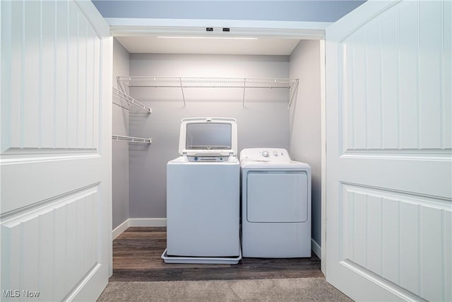 washroom featuring washing machine and dryer