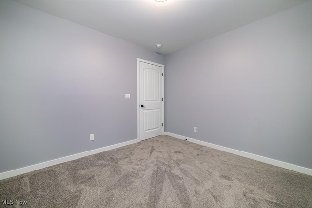 spare room with carpet floors