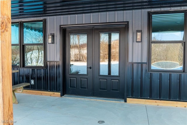 entrance to property featuring french doors