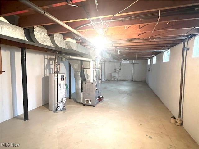 basement with heating unit and gas water heater