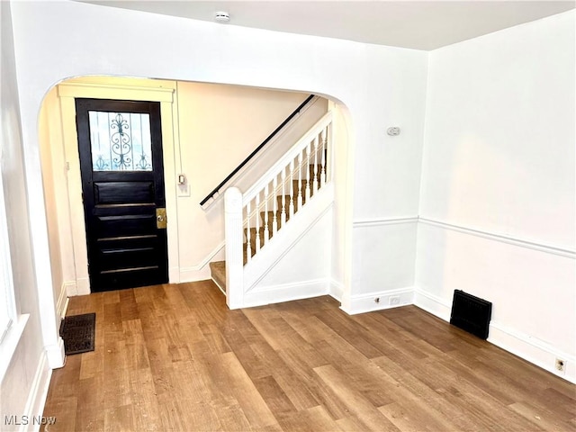 entrance foyer featuring hardwood / wood-style floors