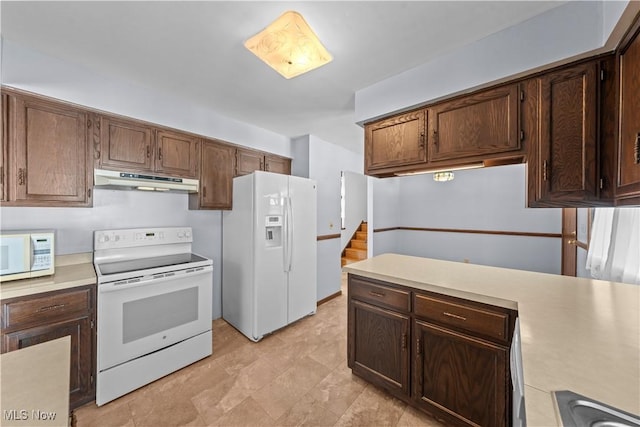 kitchen featuring white appliances